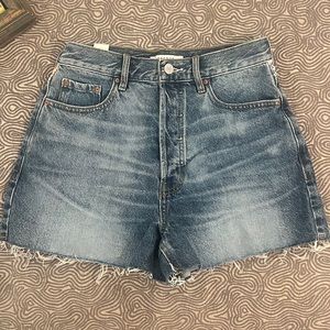 Cute PacSun jean shorts with cute flowers embroidered on the back in a size 27.